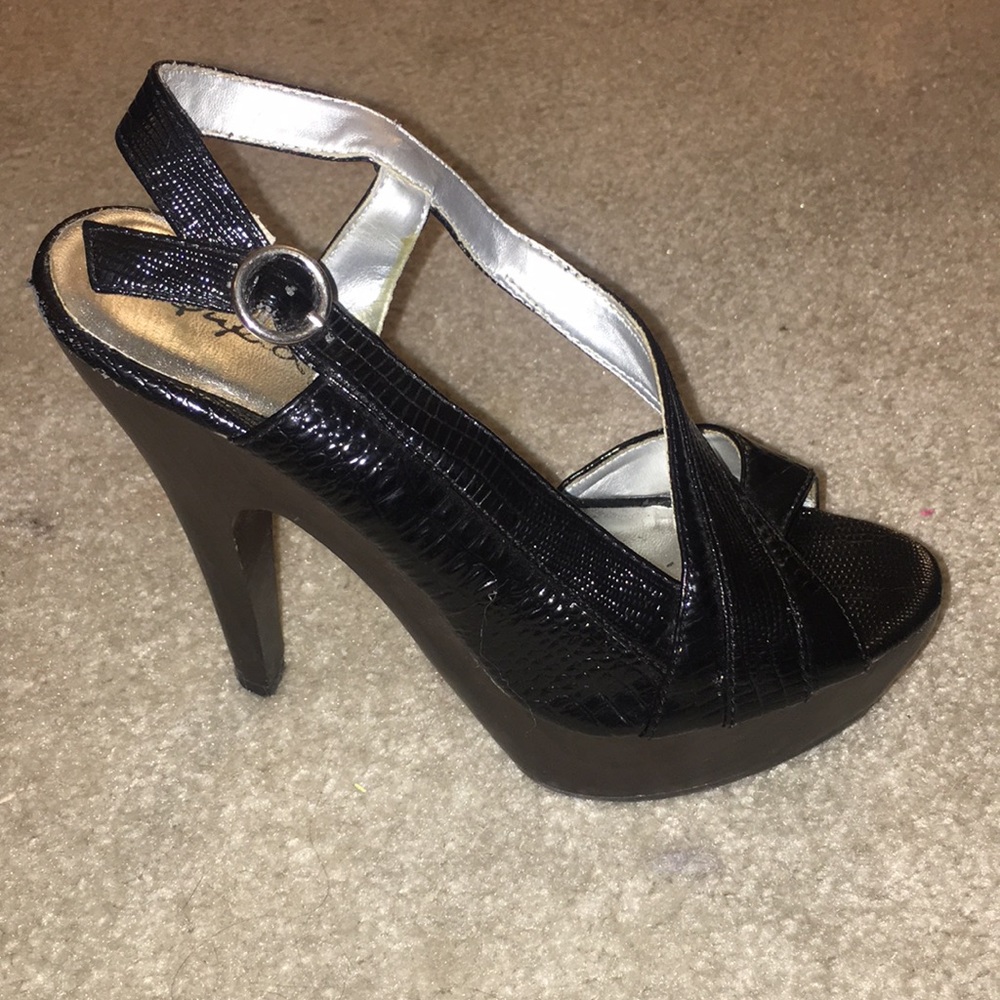 Black and brown platform pumps